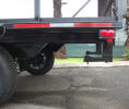 Custom 8 x 14 ATV Trailer with 7,000lb GVWR, Two 3,500lb Axles with One Braking Axle, 1 ½” Square Tubing Frame, 3” 5 on 4 ½ Tires and Wheels, 14” Rail Side Rail with section Folding on Right Side, Painted Trailer Undercarriage, 5/8in D-Rings, Ramp with Spring Assist, Spare tire and Wheel, Spare Mount, Breakaway Kit, 7 Way Plug, Two Stabilizer Stands, E Track on Floor, Box, Winch Plate.