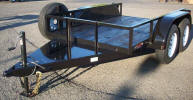 5' X 8' 7,000lb GVWR Custom Utility Trailer Built with Electric Brakes, 2 5/16" Coupler, Breakaway Kit, Spare Tire and Wheel Mounted, Frame 16" on Center, Two Extra Cross Members, Steel Tongue Pad