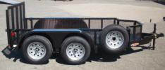 5 x 9 Custom Standard Utility Trailer with 2,990lb. GVWR, Two 3,500lb 4" Drop Axles, 2” A Frame Coupler, Z Tongue, 3' Gate, Spare Tire and Wheel, Spare Tire Mount, Mesh Sides, 8 -D Rings, White Modular Rims, Cut Out in Front for Wheel Chock, Equalizer/Leaf Spring Suspension, 15” / 5 on 5 / 4 Ply Tires & Wheels, 2,000lb. Jack, 3 x 2 x 3/16 Angle Top Rail, 4” Channel Tongue, Painted Trailer Undercarriage