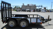 77 x 10 Standard Utility Trailer with 7,000lb. GVWR, 2-5/16" A Frame Coupler, Equalizer/Leaf Spring Suspension, 15" / 5 on 5 / 4 Ply Tires & Wheels, 2,000lb. Jack, 3 x 2 x 3/16 Angle Top Rail, 4" Channel Tongue, Painted Trailer Undercarriage, Two 4" Drop Axles One Electric Braking Axle, 7 Way Plug, Breakaway Kit, Pintle Hook, Z Tongue, Ramp gate with two Spring Assists, Knife Edge on Ramp